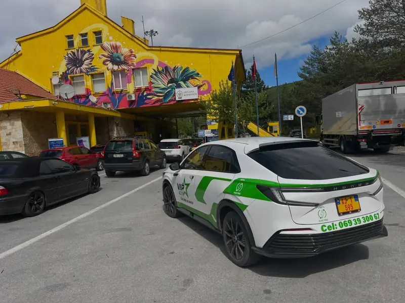 VIP electric taxi from Elbasan at the Kapshtica border crossing — cross-border rides