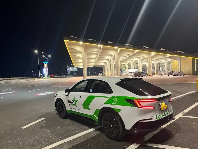 Electric taxi waiting at night — Elbasan airport transfer service